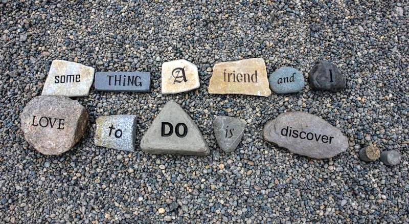 Word Garden rocks making a sentence "a thing a fiend an I love to do is discover"